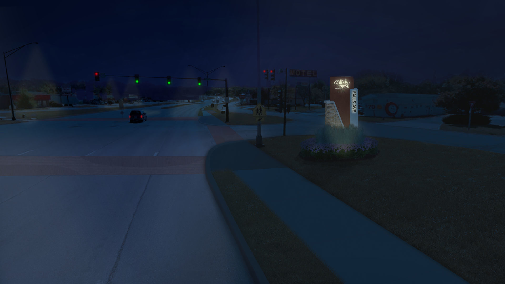 University and Falls Avenue at night